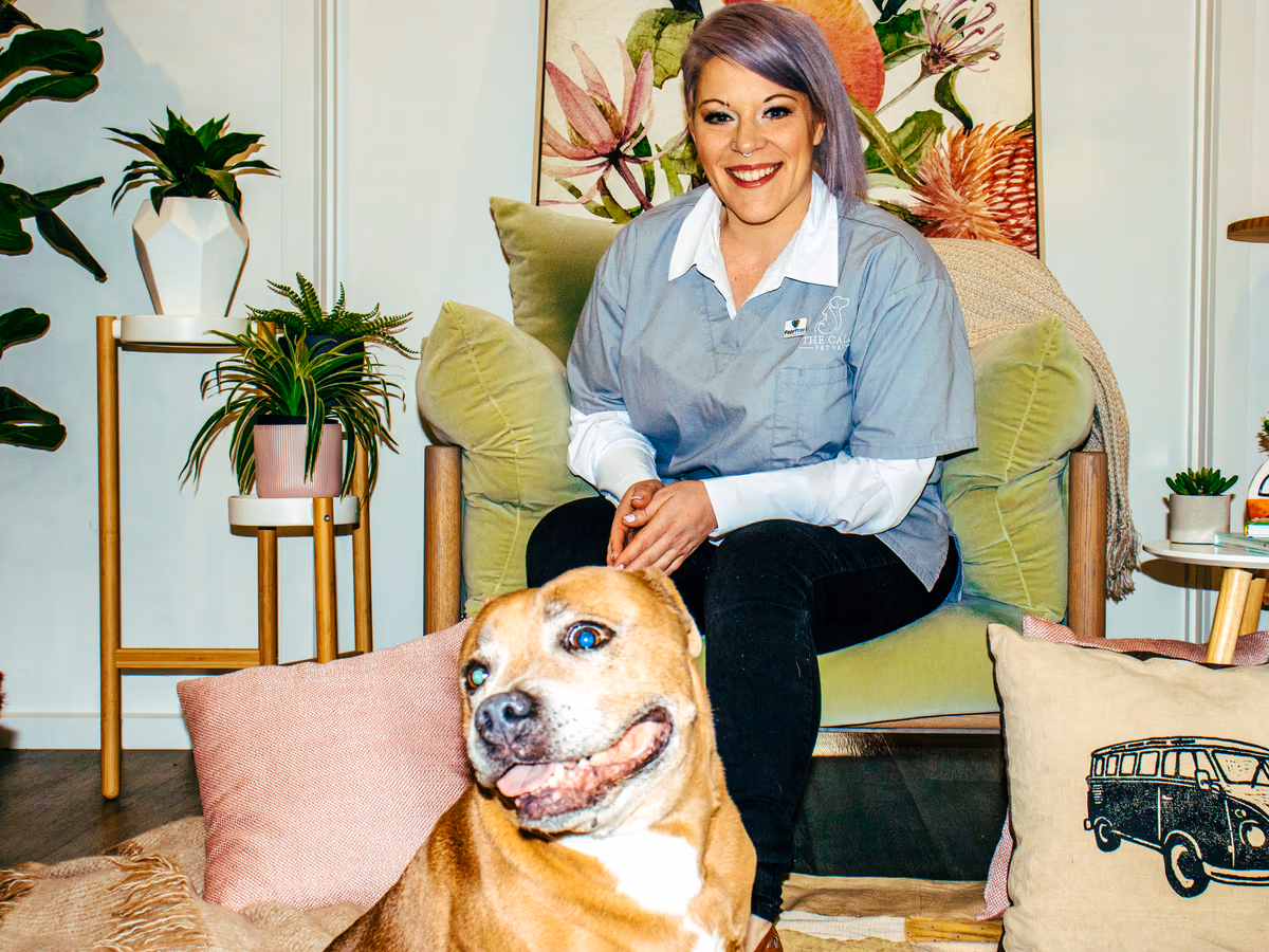 Dr Chantelle McGowan with a relaxed dog during a behaviour consultation